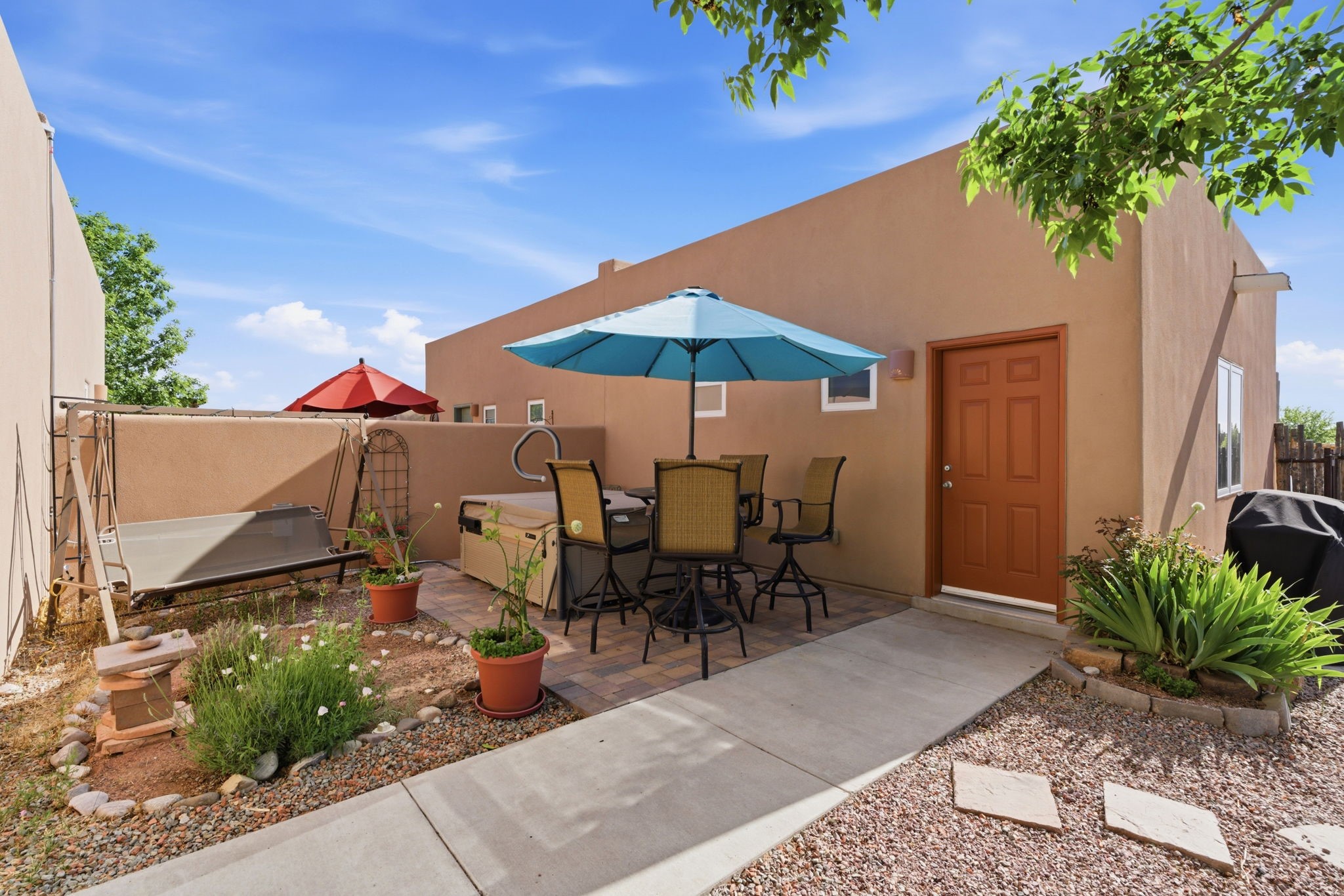 3 Silver Buckle Road Santa Fe, NM 87508 - Photo 31 of 34 Entry to finished 2-car garage from backyard