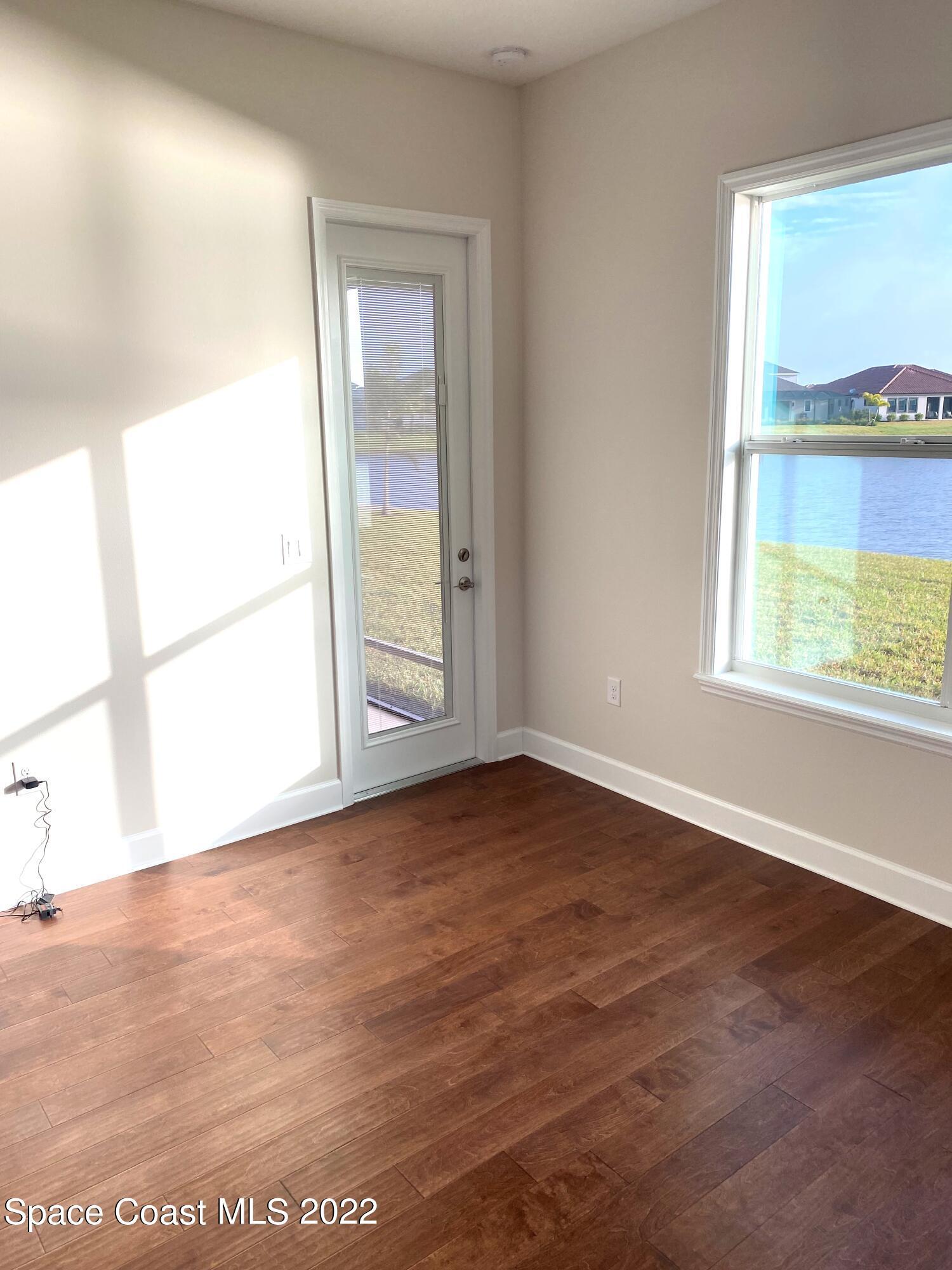 8321 Paragrass Avenue Melbourne, FL 32940 - Photo 16 of 41 an empty room with a window