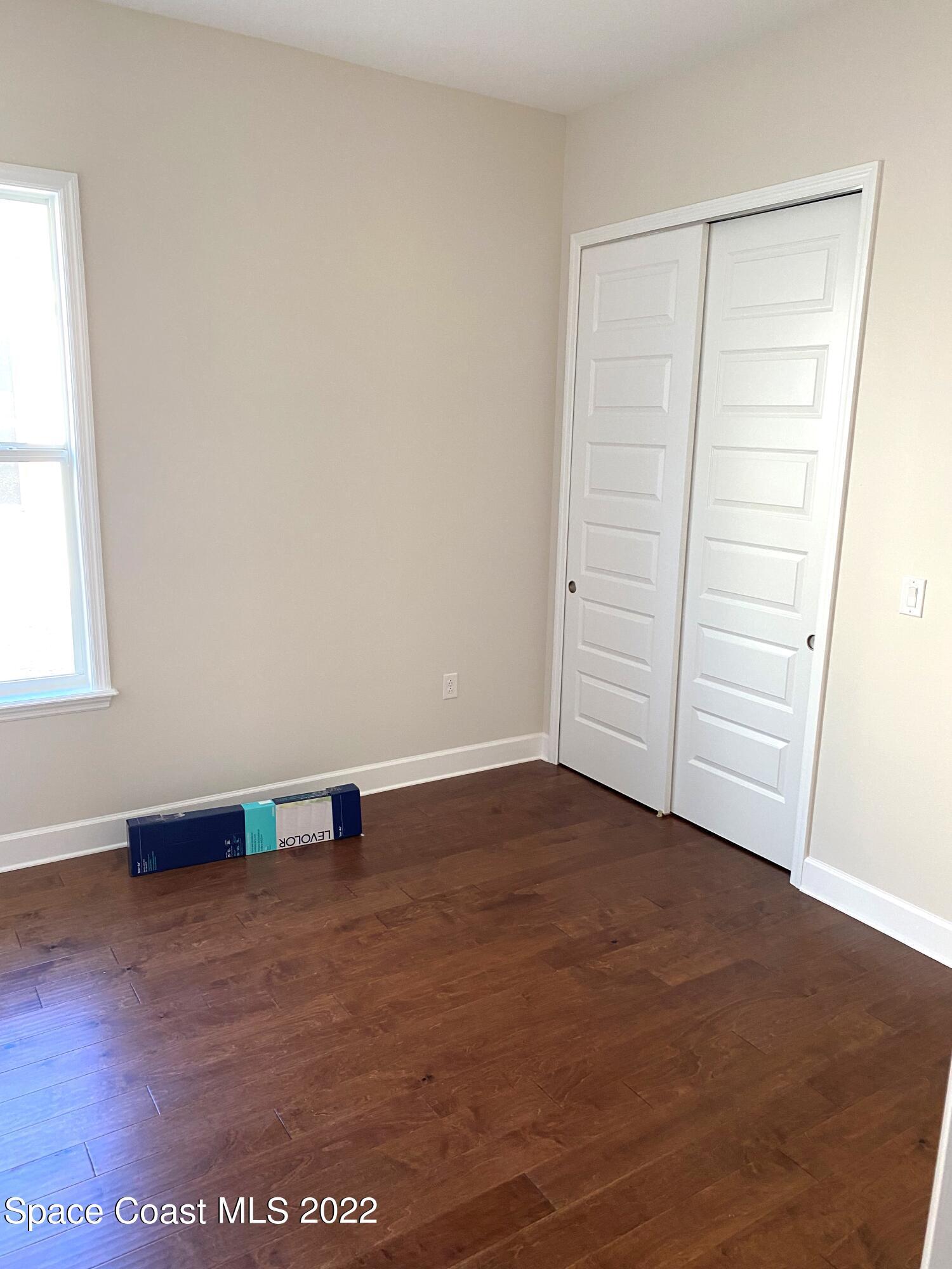 8321 Paragrass Avenue Melbourne, FL 32940 - Photo 25 of 41 an empty room with window
