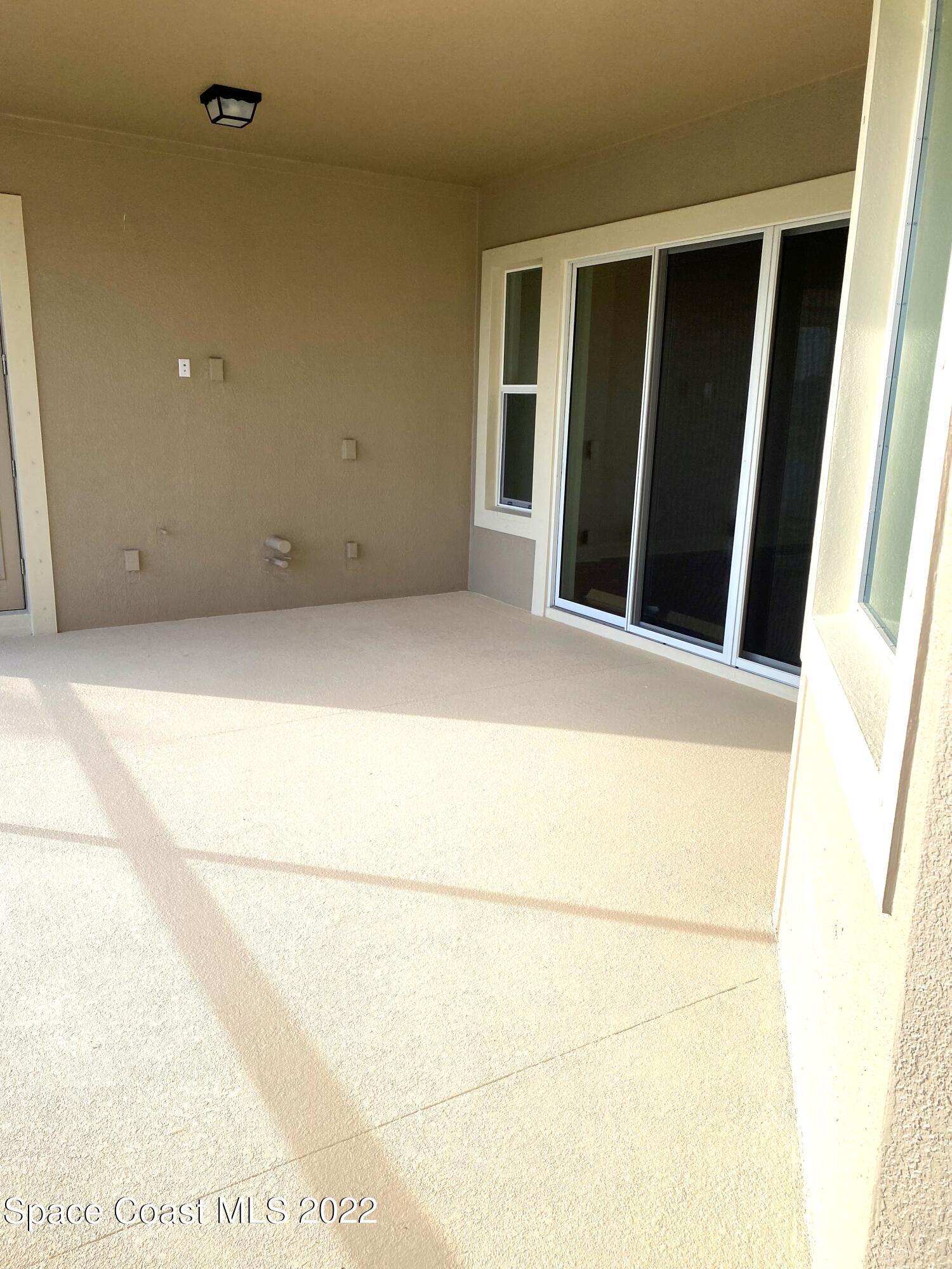 8321 Paragrass Avenue Melbourne, FL 32940 - Photo 30 of 41 a view of an empty room