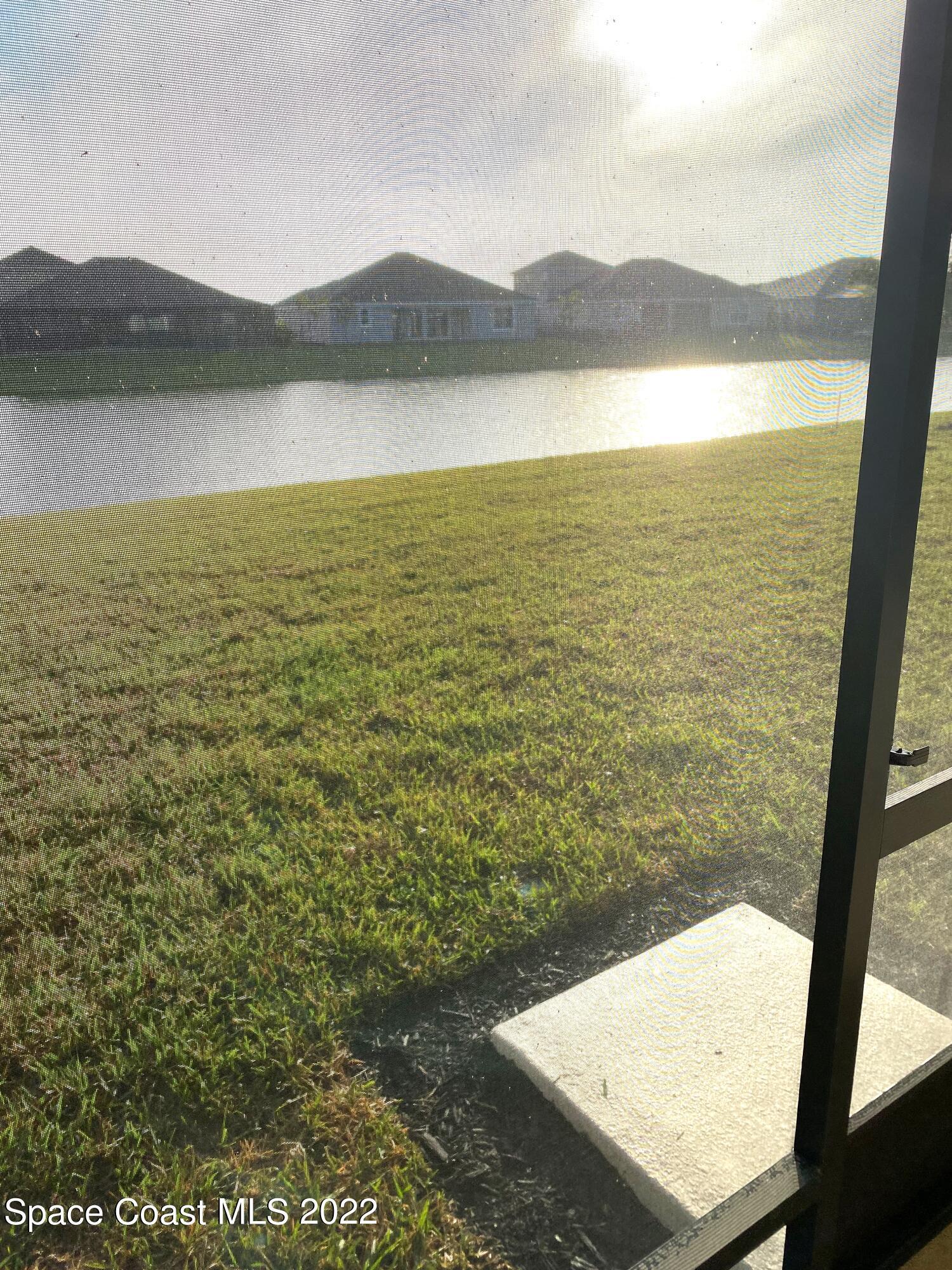 8321 Paragrass Avenue Melbourne, FL 32940 - Photo 35 of 41 a view of lake