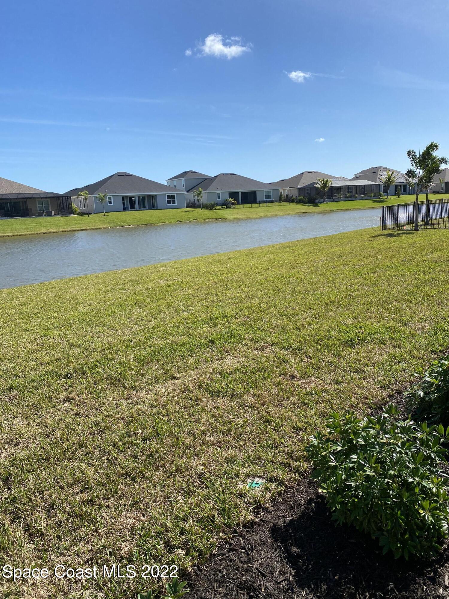 8321 Paragrass Avenue Melbourne, FL 32940 - Photo 39 of 41 a view of an ocean and a city