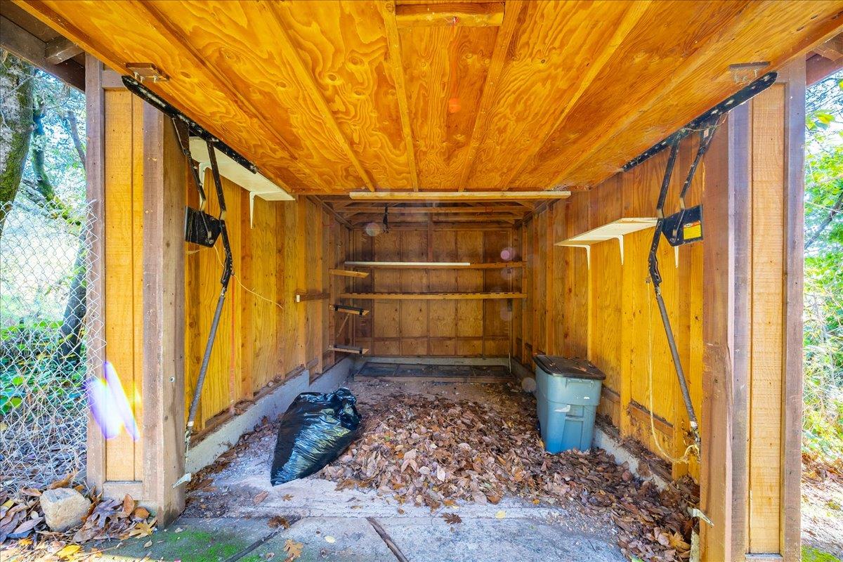 155 Pinewood Way Auburn, CA 95602 - Photo 67 of 92 a view of a back yard with wooden floor and a window