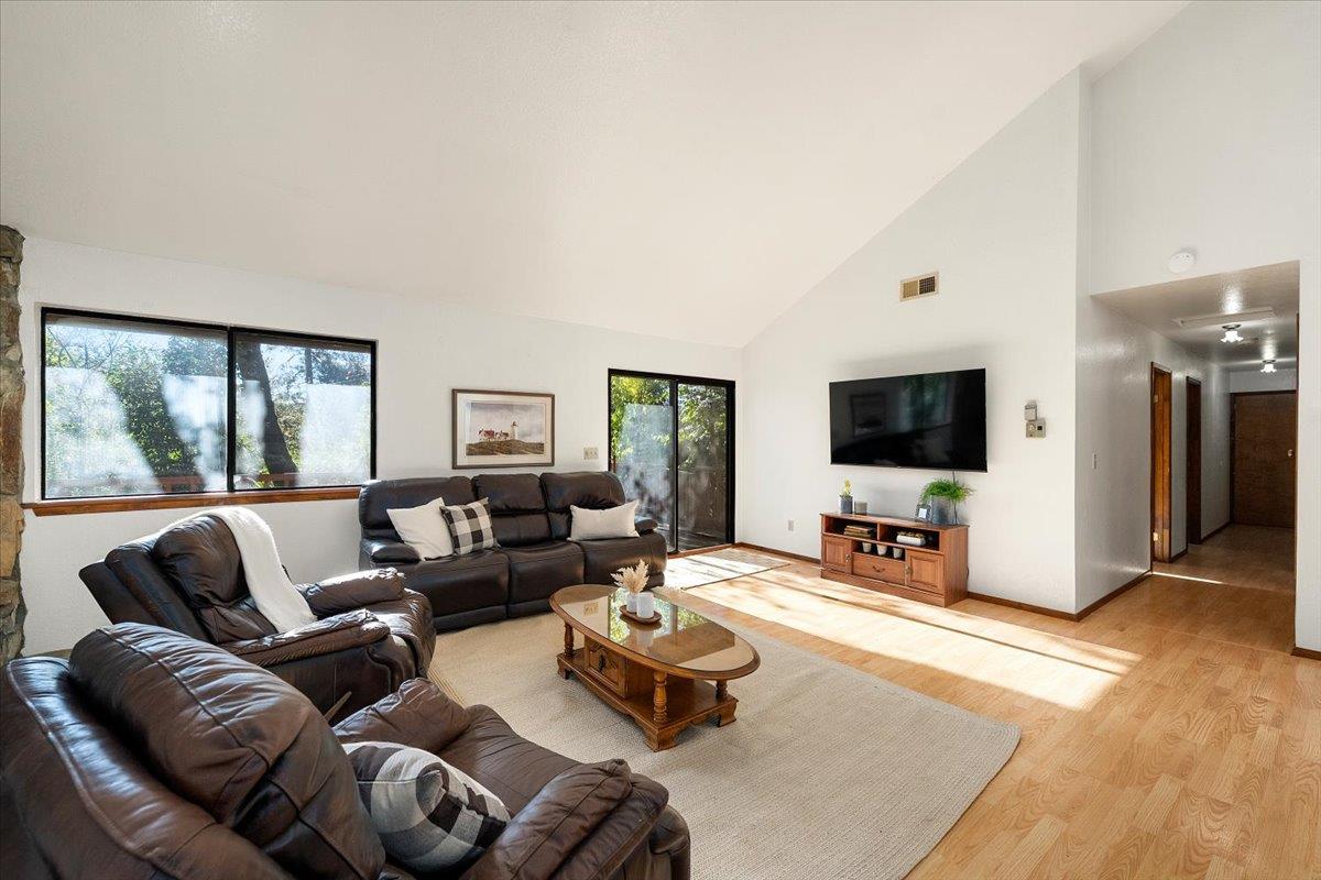 155 Pinewood Way Auburn, CA 95602 - Photo 9 of 92 a living room with furniture and a flat screen tv