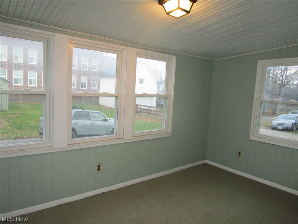 1938 East Prospect Road Ashtabula, OH 44004 - Photo 38 of 49 Sunroom with view of back yard and lots of natural light