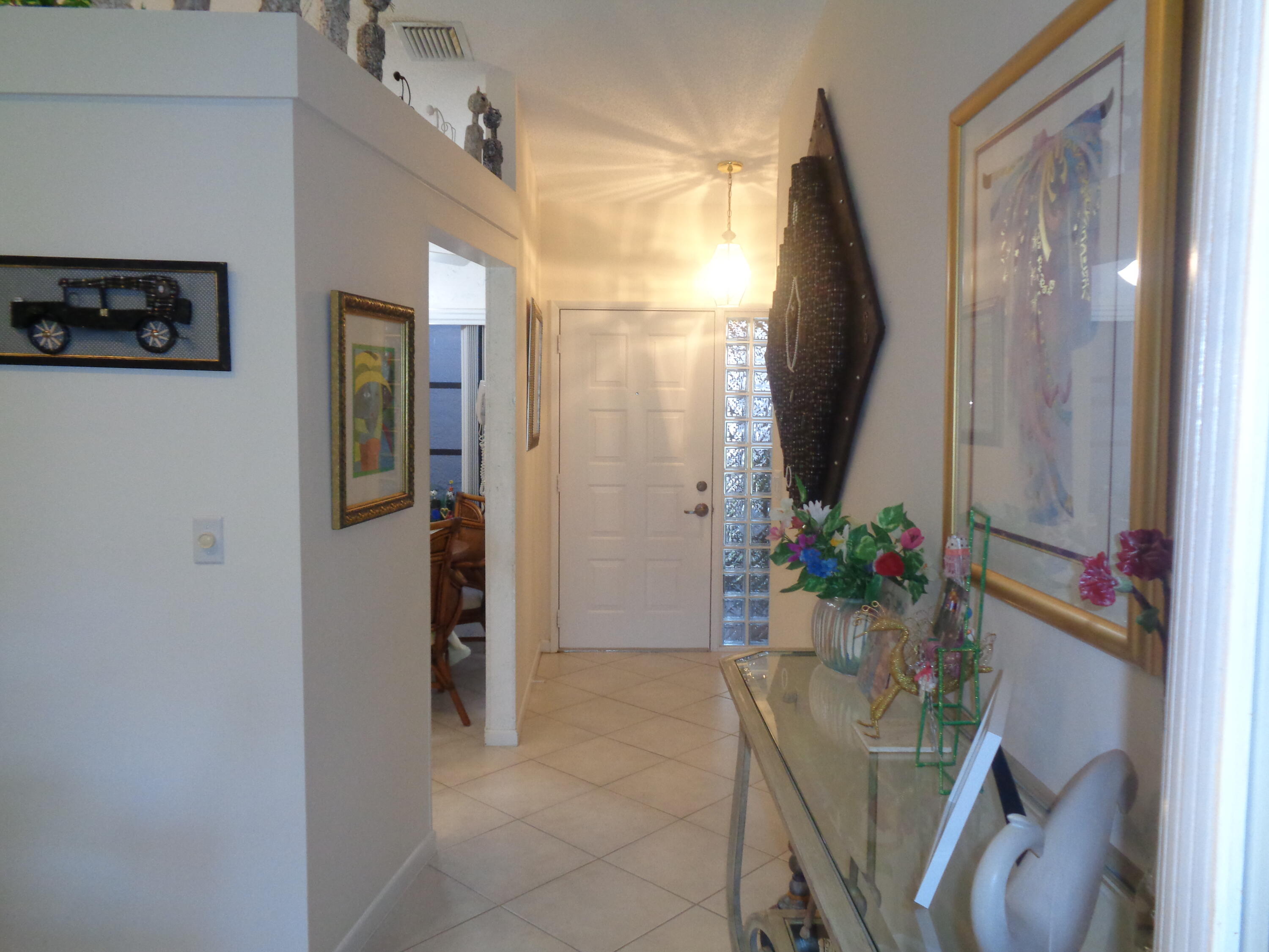 8265 Summersong Terrace, Unit E Boca Raton, FL 33496 - Photo 6 of 46 Foyer