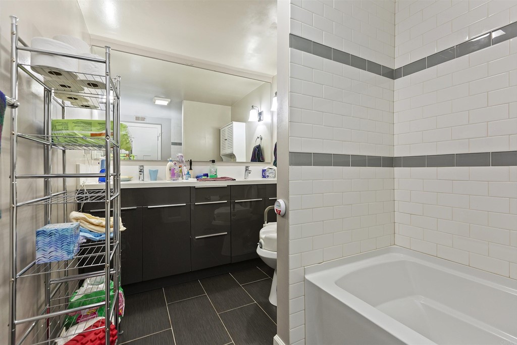 1387 Hygeia Avenue Encinitas, CA 92024 - Photo 17 of 45 a bathroom with a sink toilet and shower