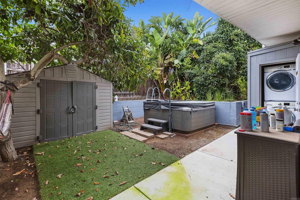 1387 Hygeia Avenue Encinitas, CA 92024 - Photo 30 of 45 a view of a chair and table in the back yard
