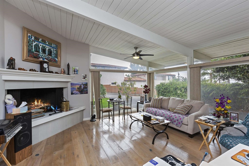 1387 Hygeia Avenue Encinitas, CA 92024 - Photo 9 of 45 a living room with furniture and a fireplace