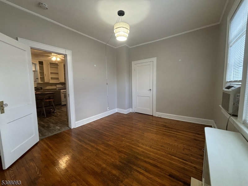 18 Laura Avenue, Unit 1 Nutley, NJ 07110 - Photo 17 of 27 a view of empty room with wooden floor