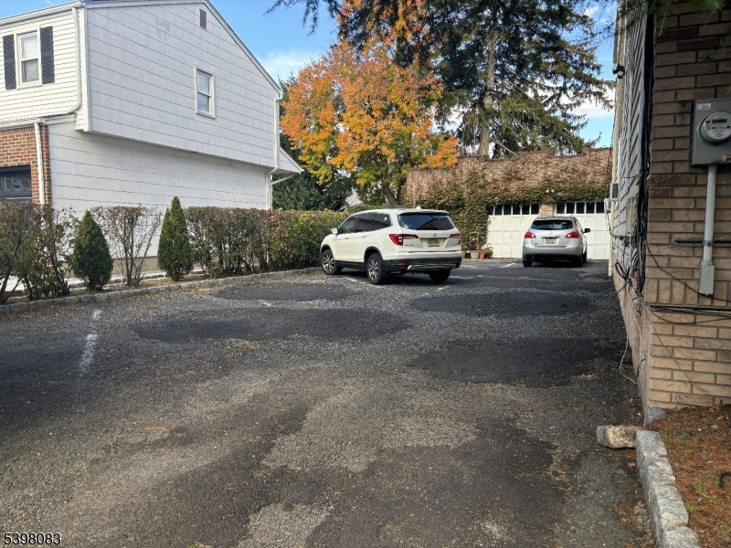 18 Laura Avenue, Unit 1 Nutley, NJ 07110 - Photo 27 of 27 a view of a car parked in front of a house