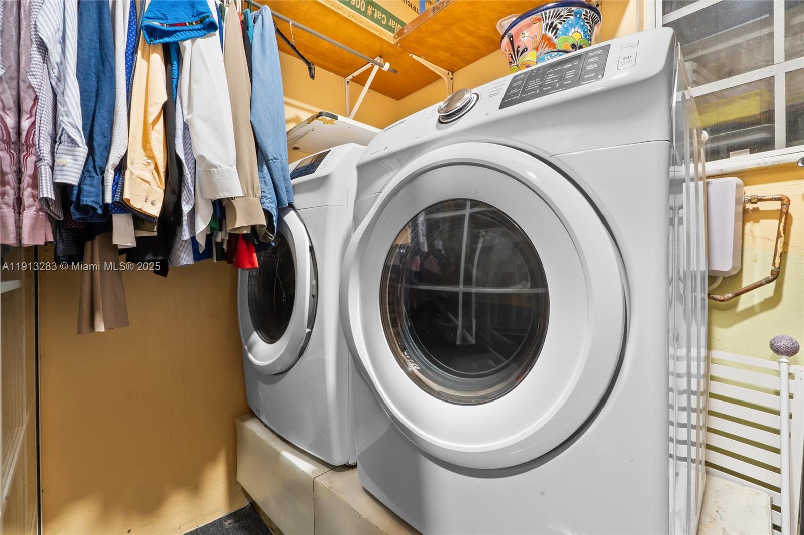 12535 Southwest 219th Street Miami, FL 33170 - Photo 23 of 31 a utility room with dryer and washer