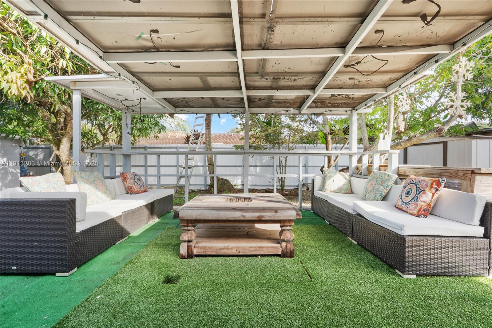 12535 Southwest 219th Street Miami, FL 33170 - Photo 24 of 31 a view of yard with outdoor seating