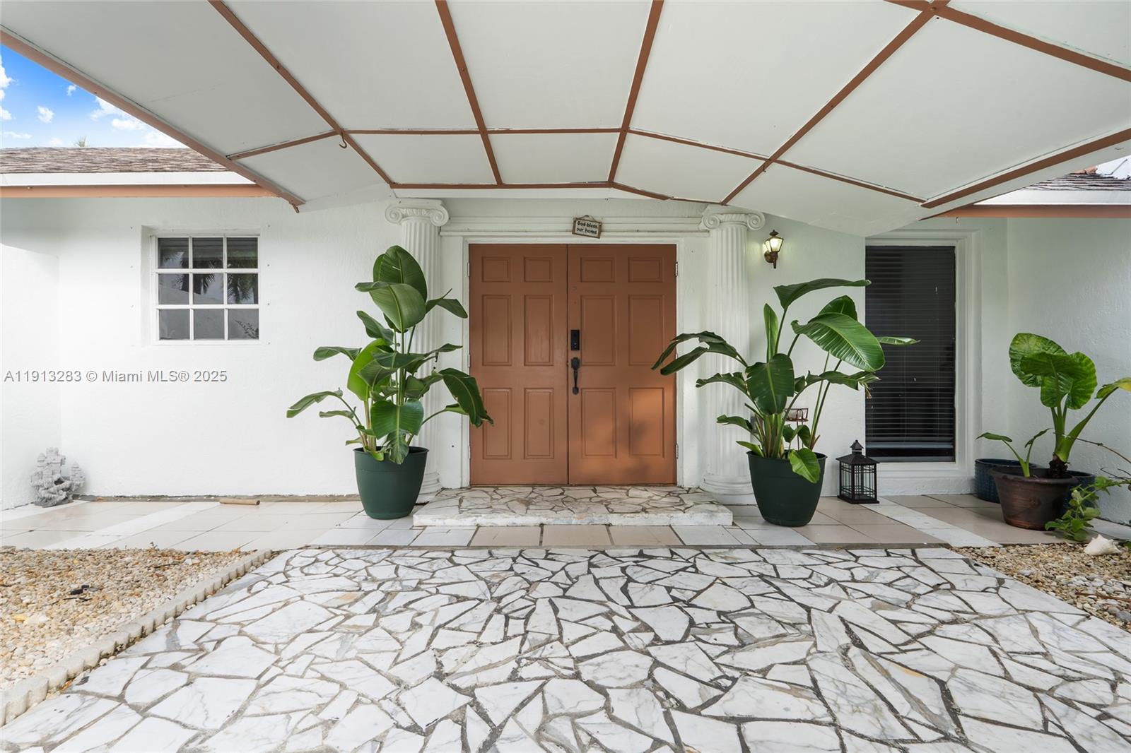 12535 Southwest 219th Street Miami, FL 33170 - Photo 3 of 31 a view of a entryway door