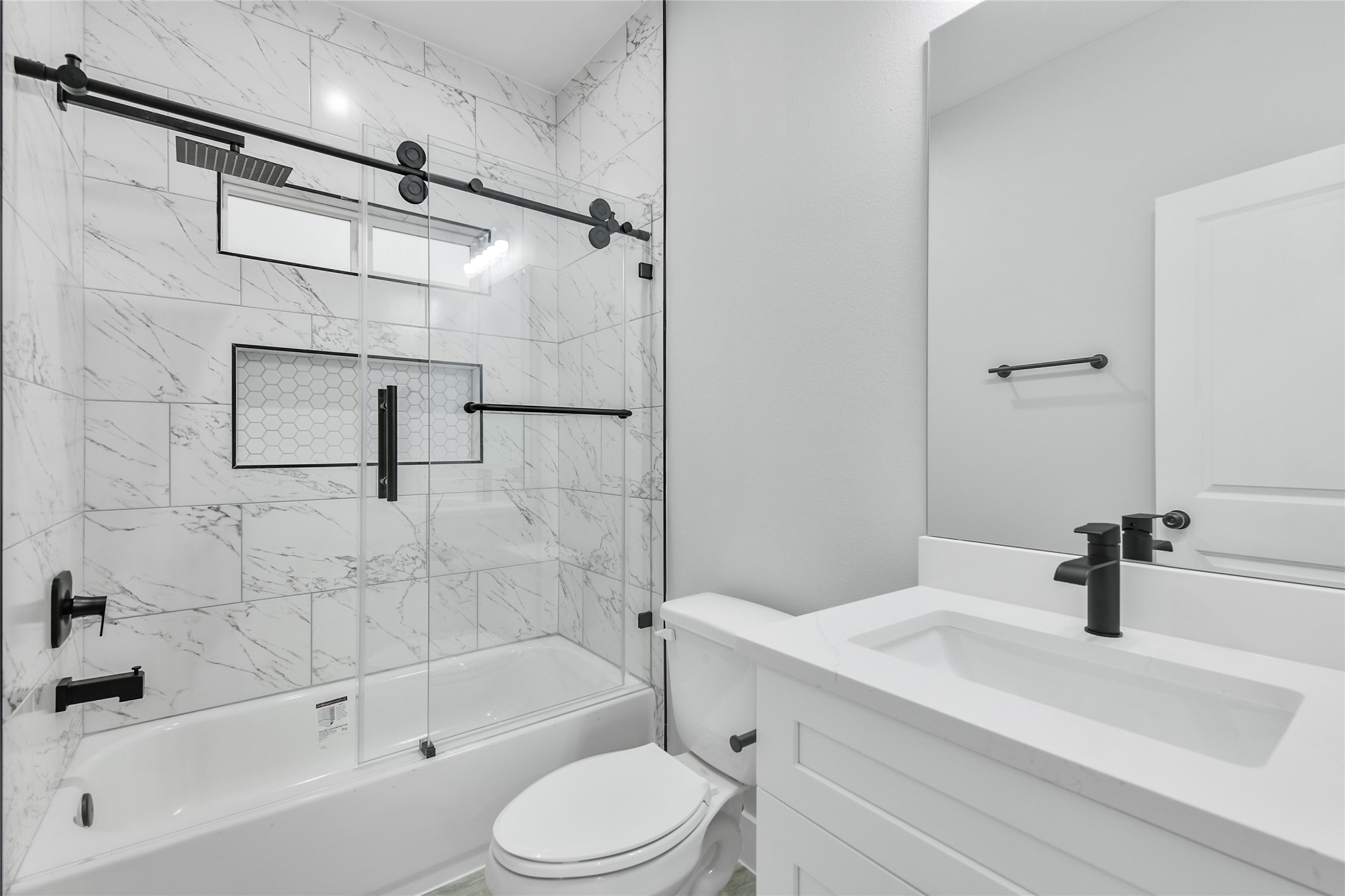 15113 Austin Road Willis, TX 77378 - Photo 26 of 37 a bathroom with a sink toilet and shower