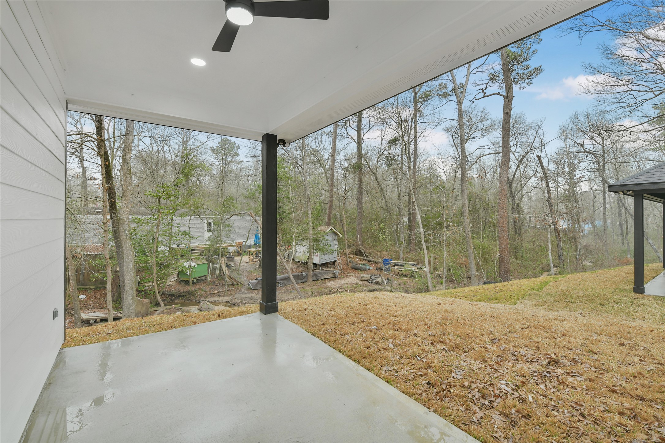 15113 Austin Road Willis, TX 77378 - Photo 30 of 37 a bathroom with a tub and shower