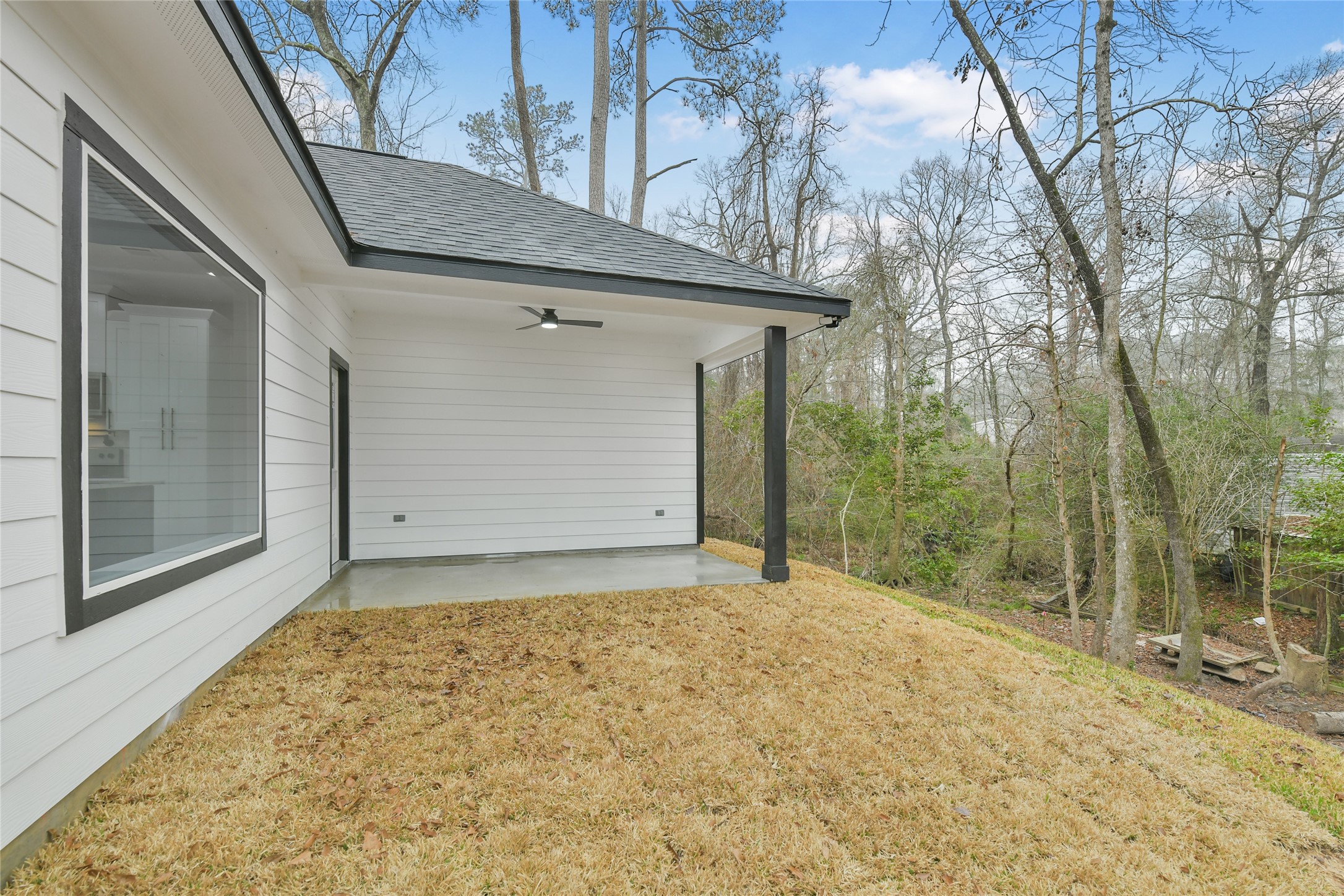 15113 Austin Road Willis, TX 77378 - Photo 33 of 37 a view of a house with a large tree