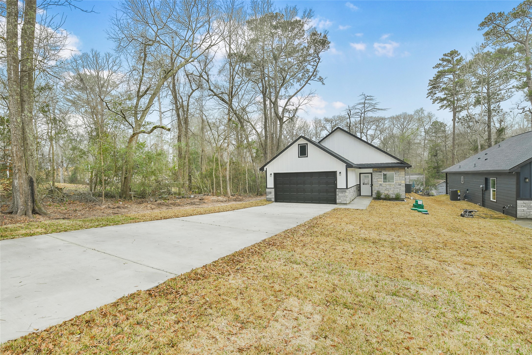 15113 Austin Road Willis, TX 77378 - Photo 37 of 37 a front view of house with yard