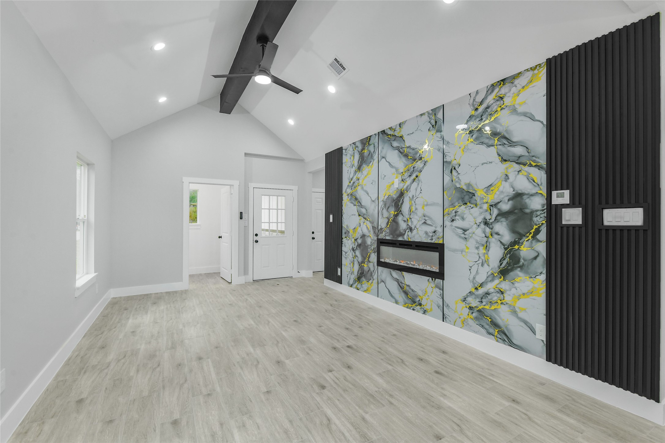 15113 Austin Road Willis, TX 77378 - Photo 5 of 37 wooden floor in an empty room with a window