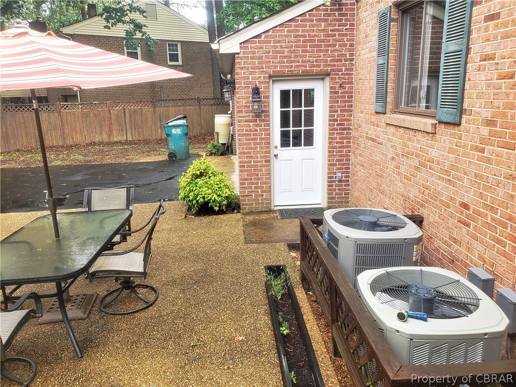 230 Treva Road Sandston, VA 23150 - Photo 12 of 40 Dual heat pumps and pedestrian door to garage