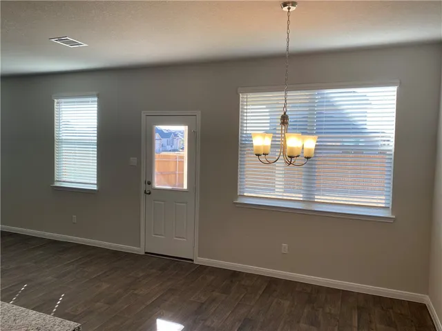 an empty room that has a window