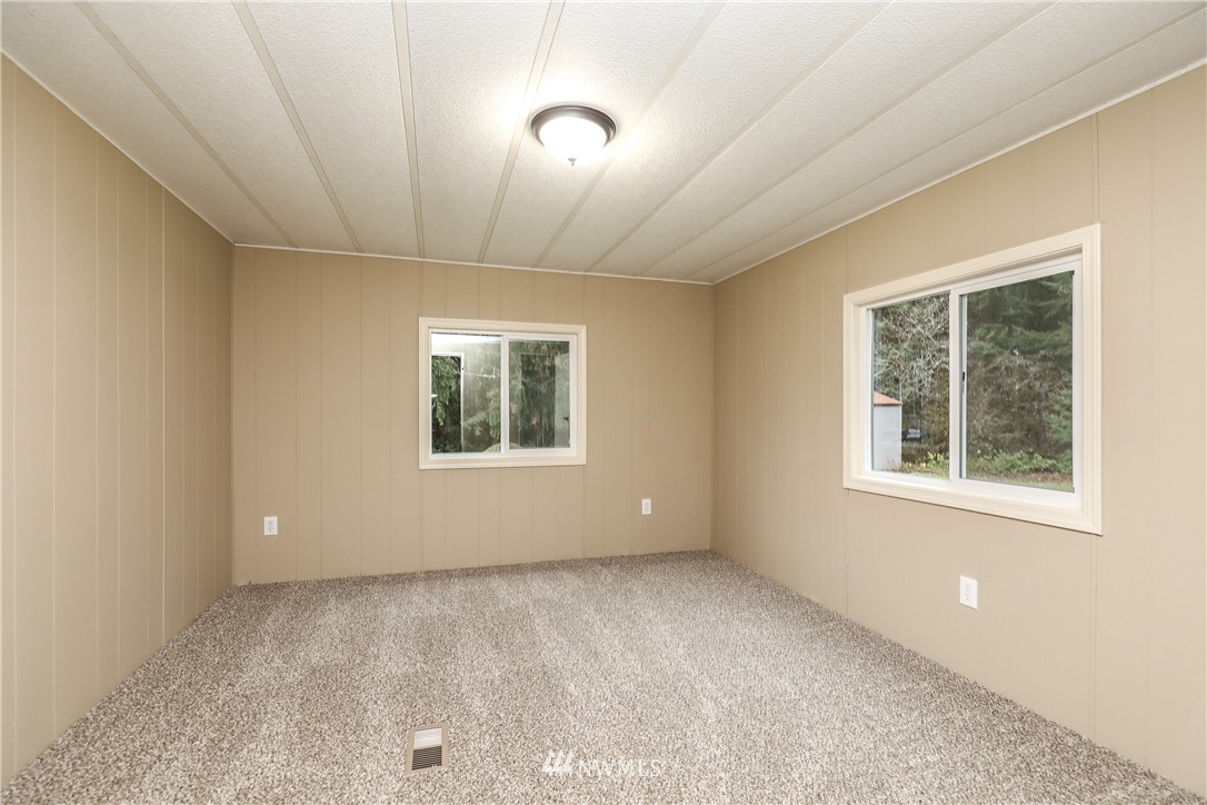 176 Palmer Road Napavine, WA 98532 - Photo 11 of 16 a view of an empty room with a window