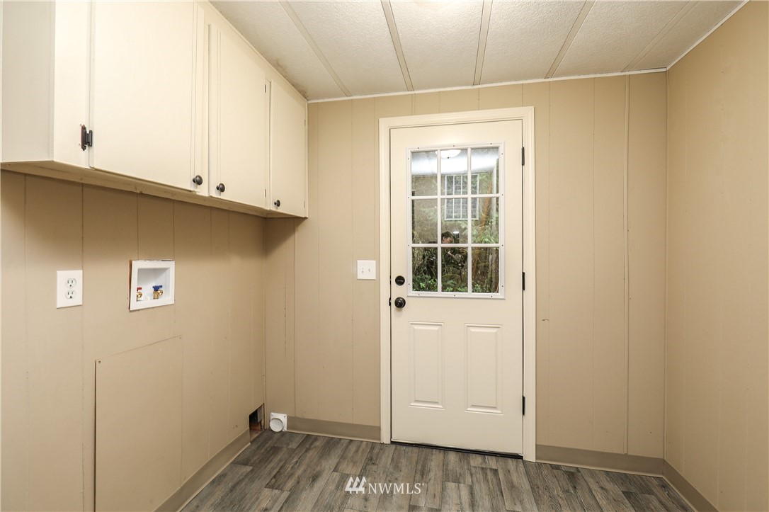 176 Palmer Road Napavine, WA 98532 - Photo 14 of 16 a view of a closet area with wooden floor