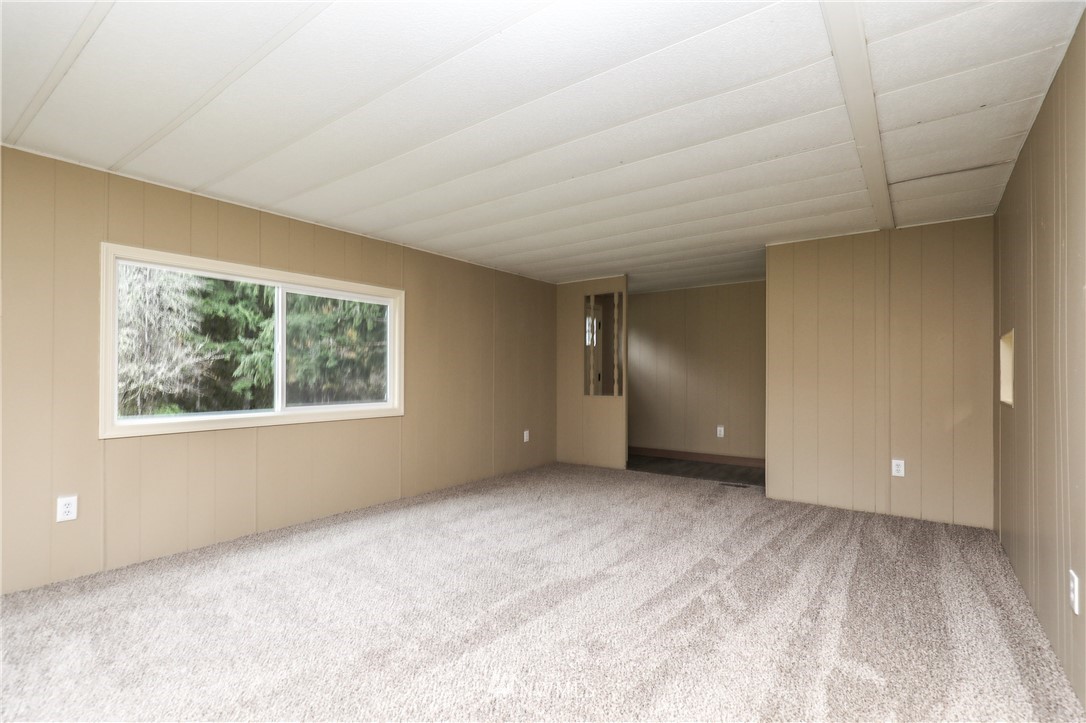 176 Palmer Road Napavine, WA 98532 - Photo 4 of 16 a view of an empty room with a window