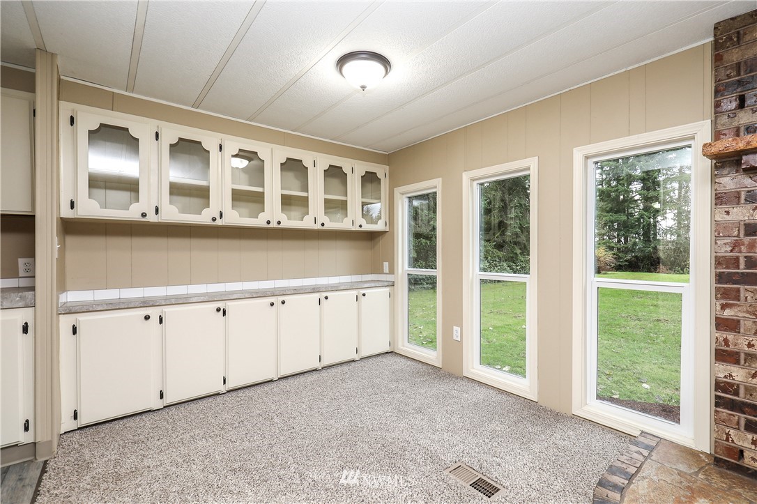 176 Palmer Road Napavine, WA 98532 - Photo 6 of 16 a view of an empty room with a window