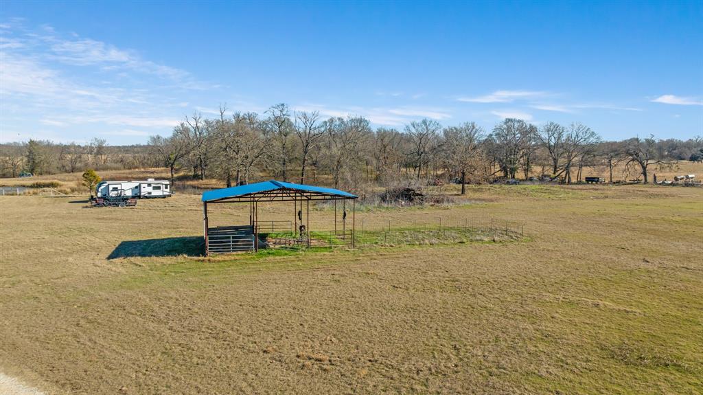 4060 County Road 36220 Sumner, TX 75486 - Photo 35 of 40 a view of a lake with a yard