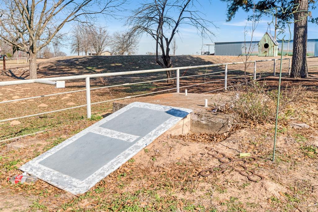 4060 County Road 36220 Sumner, TX 75486 - Photo 38 of 40 a view of a backyard with sitting area