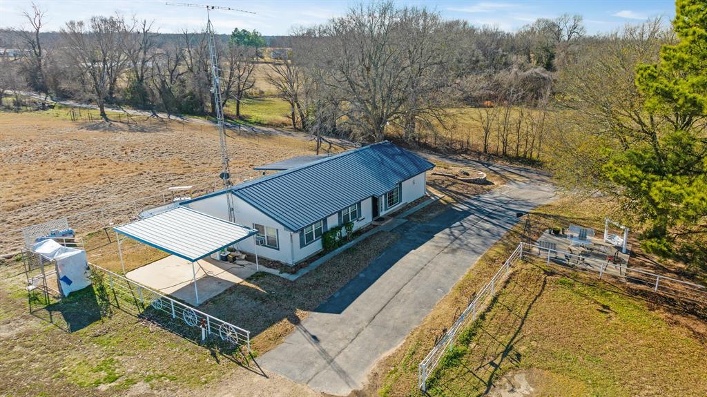 4060 County Road 36220 Sumner, TX 75486 - Photo 7 of 40 a view of a house with a yard