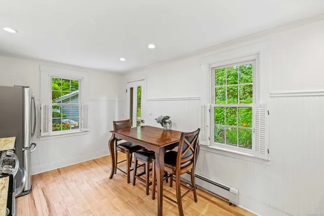 a kitchen with stainless steel appliances a refrigerator stove and microwave