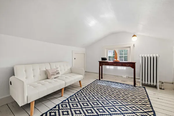 a utility room with cabinets and washer dryer