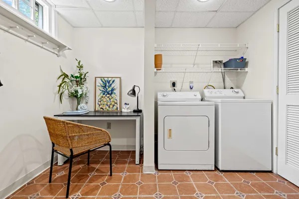a dining room that has a table and a chair
