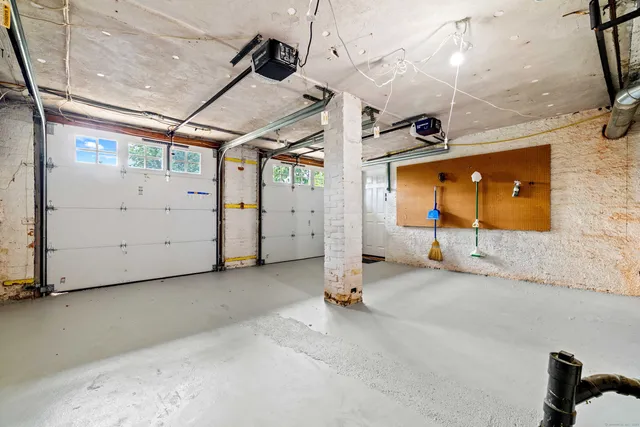 a front view of house with a garden