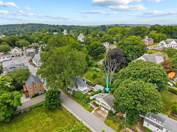 a view of a garden with lawn chairs
