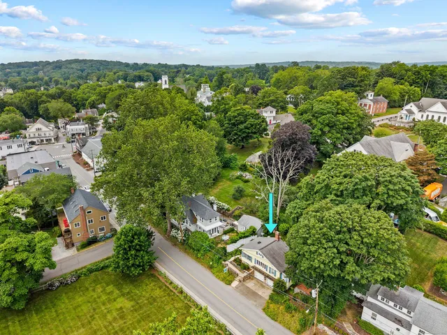 a view of a garden with lawn chairs