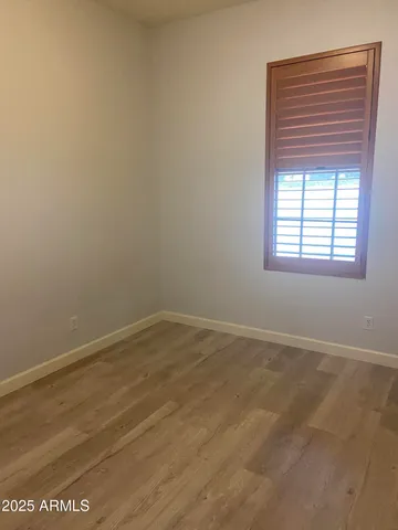 a bathroom with a shower and a toilet