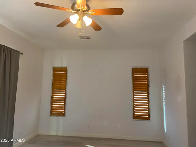 a bathroom with a tub sink and a mirror