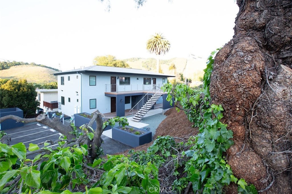 210 Laurel Street, Unit A Avila Beach, CA 93424 - Photo 15 of 16 an aerial view of a house with a garden and plants
