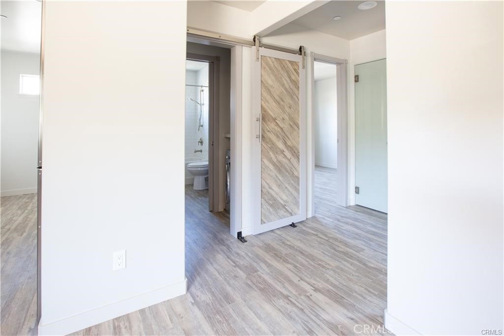 210 Laurel Street, Unit A Avila Beach, CA 93424 - Photo 6 of 16 a view of entryway with wooden floor