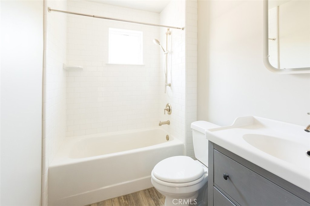 210 Laurel Street, Unit A Avila Beach, CA 93424 - Photo 10 of 16 a bathroom with a sink toilet and shower