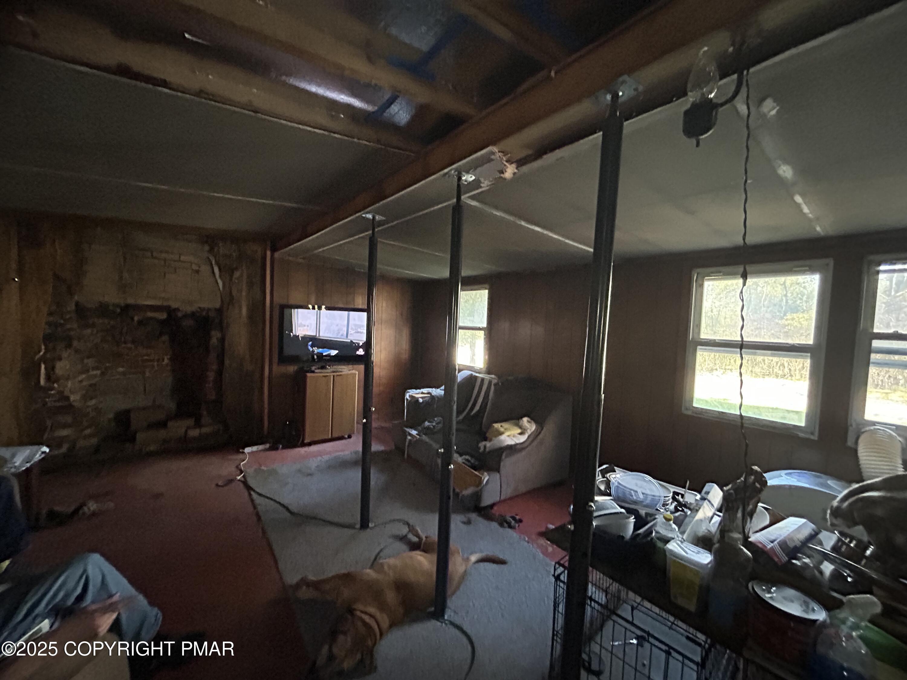 1280 Old Coach Drive Blakeslee, PA 18610 - Photo 5 of 5 a living room with furniture and a window