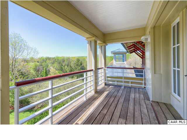 8352 Faber Road Faber, VA 22938 - Photo 21 of 32 A large balcony directly above the front door is at the other end of this spectacular landing on the second floor.