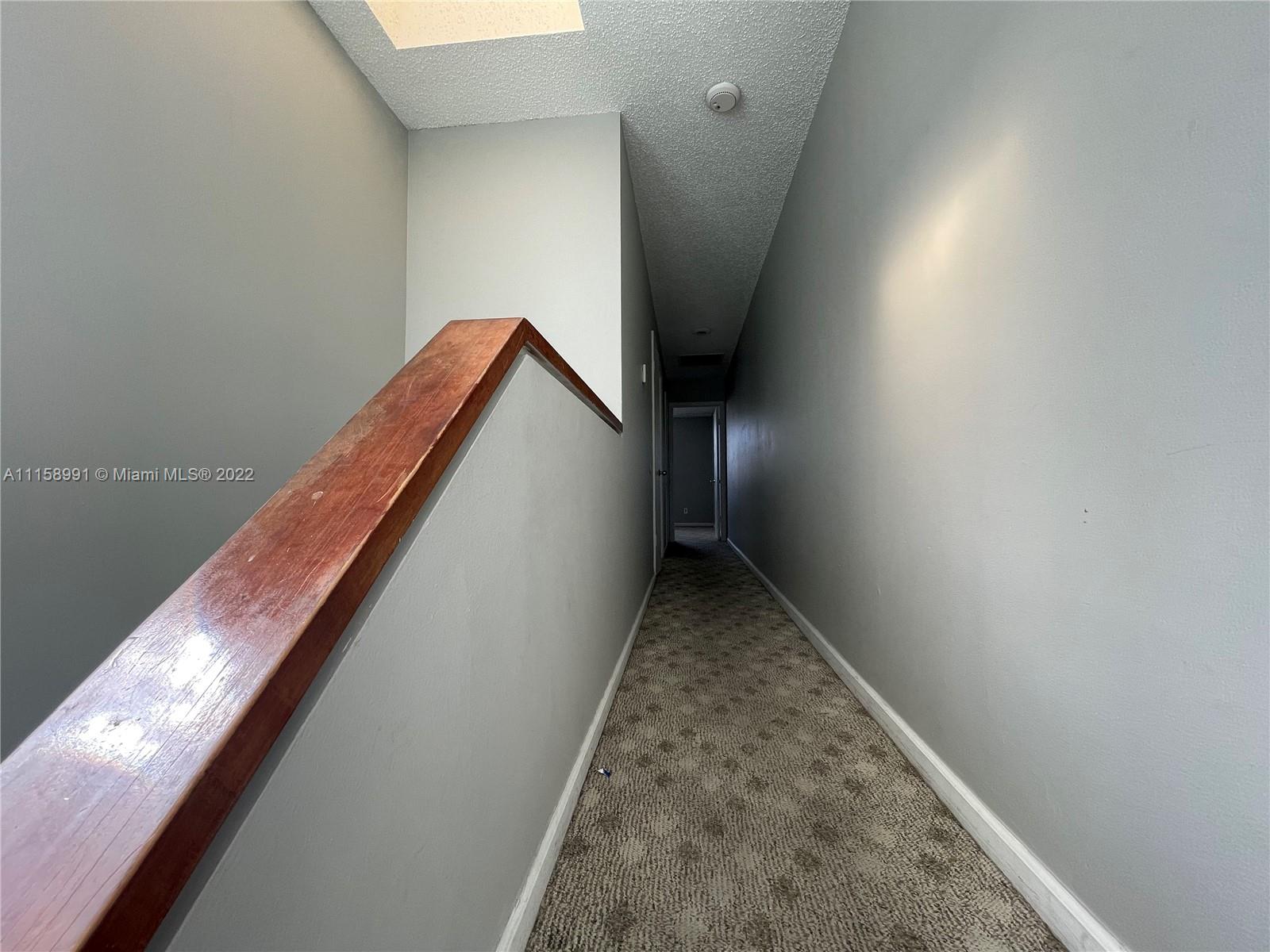 5140 Elmhurst Road, Unit H West Palm Beach, FL 33417 - Photo 9 of 15 a view of entryway