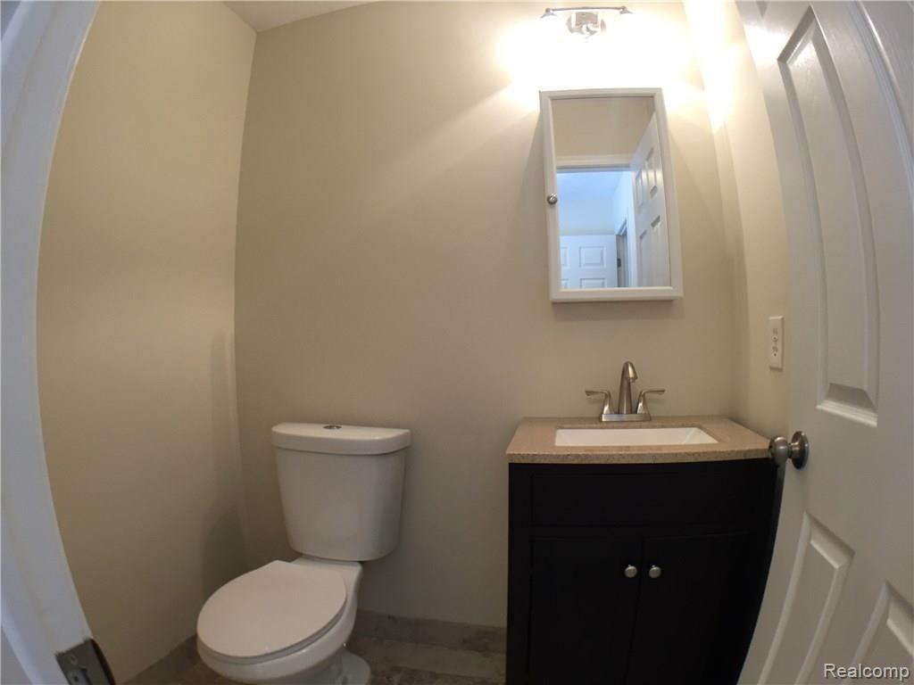 1160 Peavy Road Howell, MI 48843 - Photo 11 of 17 390 half bathroom IMG_7335.JPG