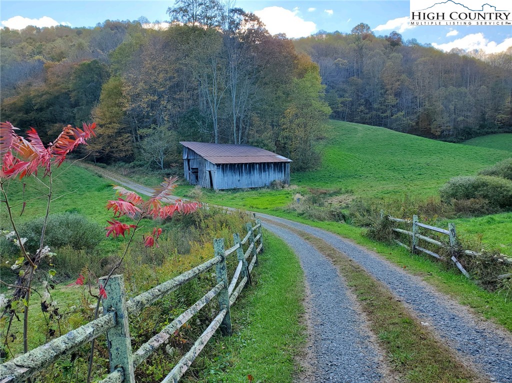 2137-2139 Little Laurel Road Creston, NC 28615 - Photo 2 of 49 a view of a back yard