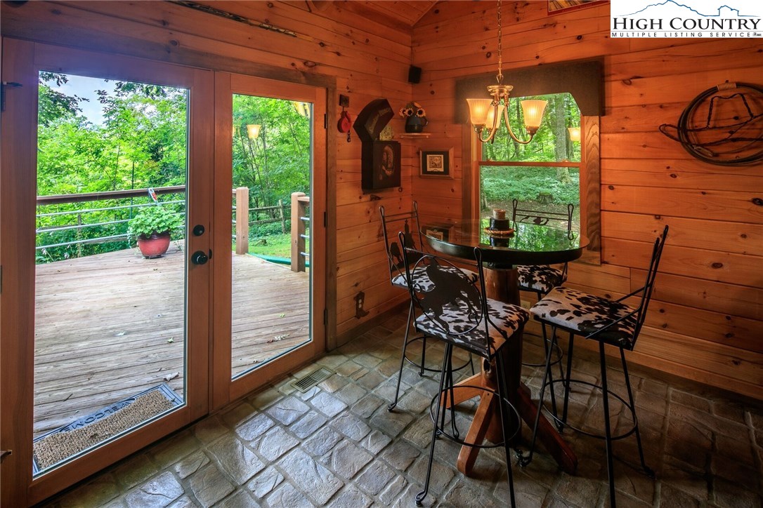 2137-2139 Little Laurel Road Creston, NC 28615 - Photo 22 of 49 a patio with table and chairs