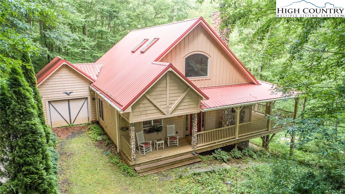 2137-2139 Little Laurel Road Creston, NC 28615 - Photo 33 of 49 a view of a house with a yard